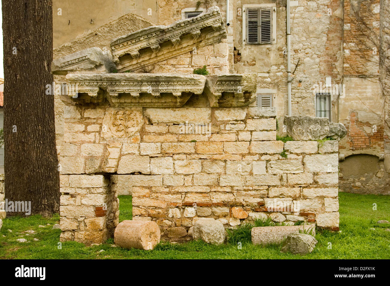 Old ancient Roman Temple ruin in the city of Porec, Istria, Croatia. Stock Photo