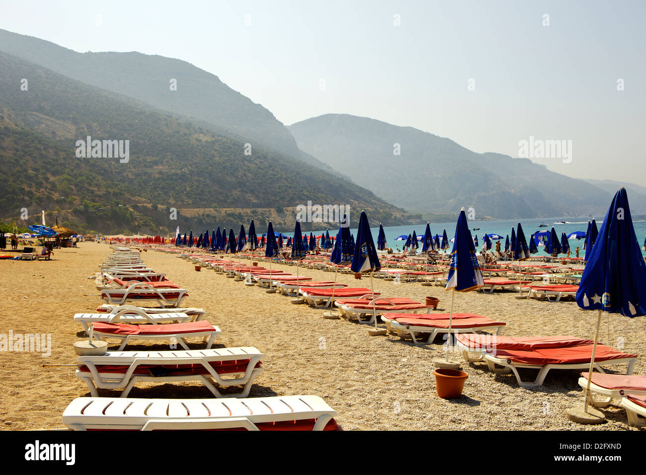 Deck chairs at Olu Deniz Sand beach, Fethiye, Oludeniz, Turkey Stock Photo