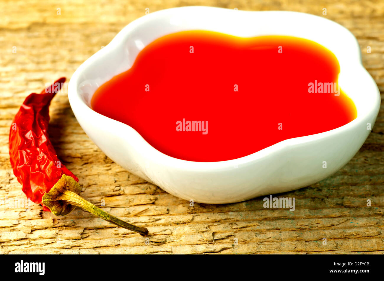 Chili oil with dried chili Stock Photo Alamy