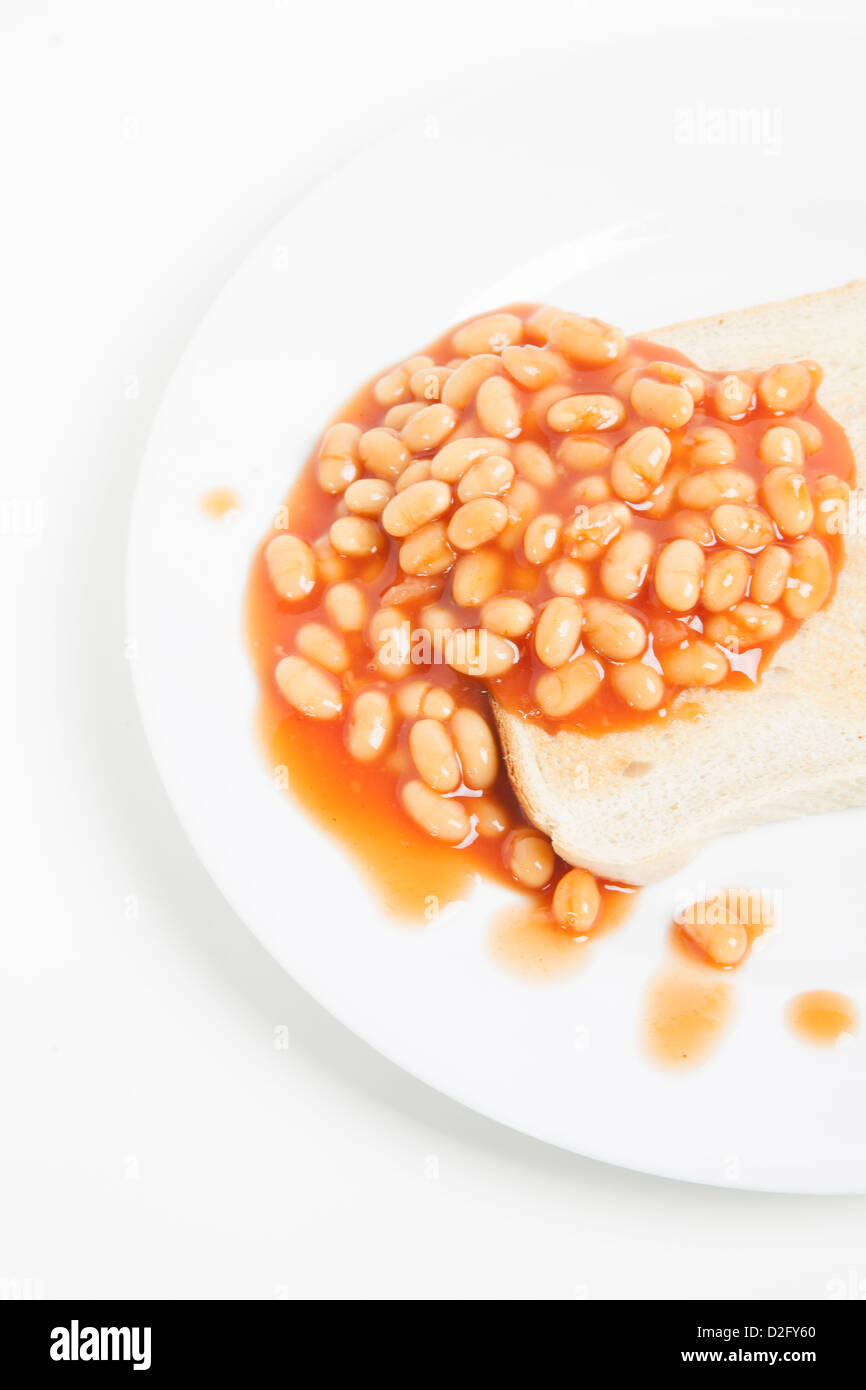 Baked beans and bread in plate Stock Photo