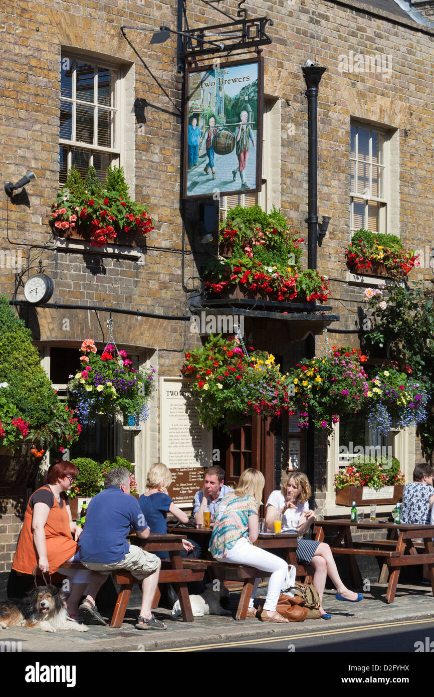 People sitting outside The Two Brewers pub on Park Street in summer Stock Photo