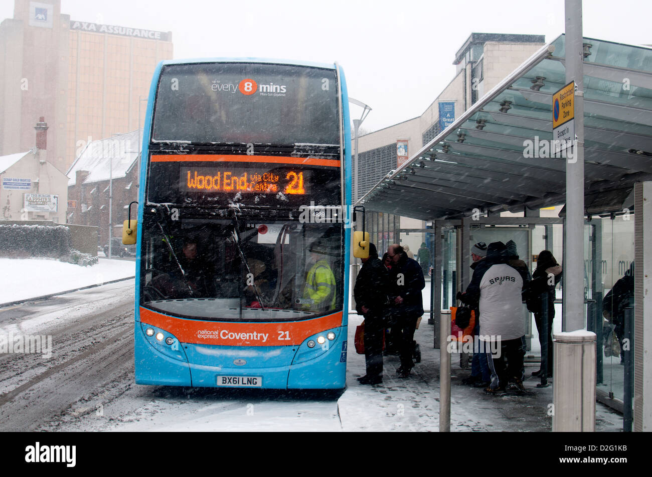 Bus in snowy weather, Coventry city centre, UK Stock Photo