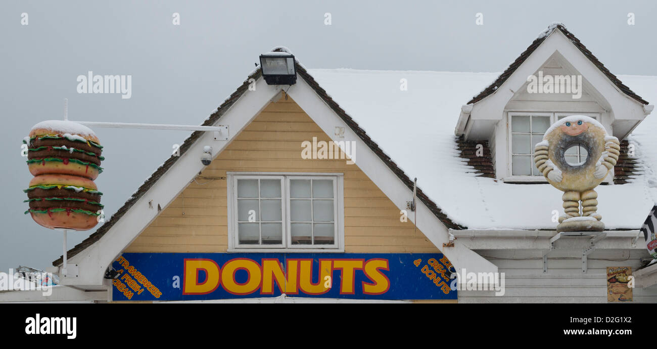 Donut, doughnut and beefburger signs, Hastings Stock Photo