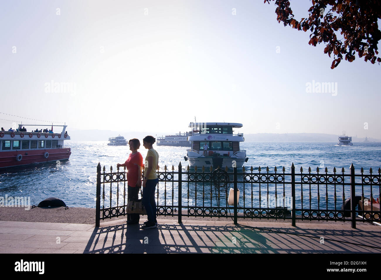 TURKEY, ISTANBUL: Tourists at Bosporus shore in Kabatas. Stock Photo