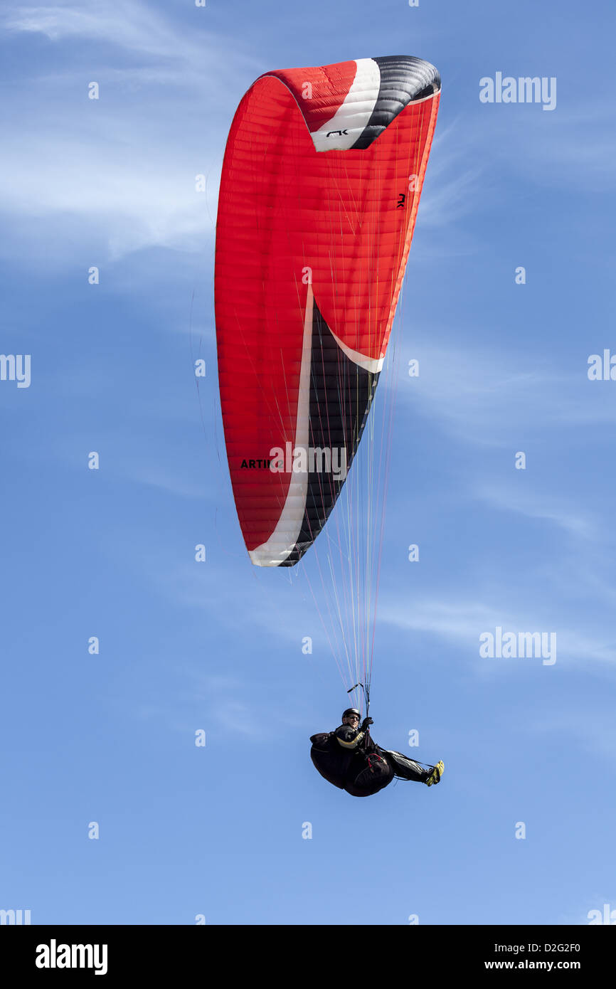 A single paraglider soaring with his Niviuk Artik 2 chute Stock Photo