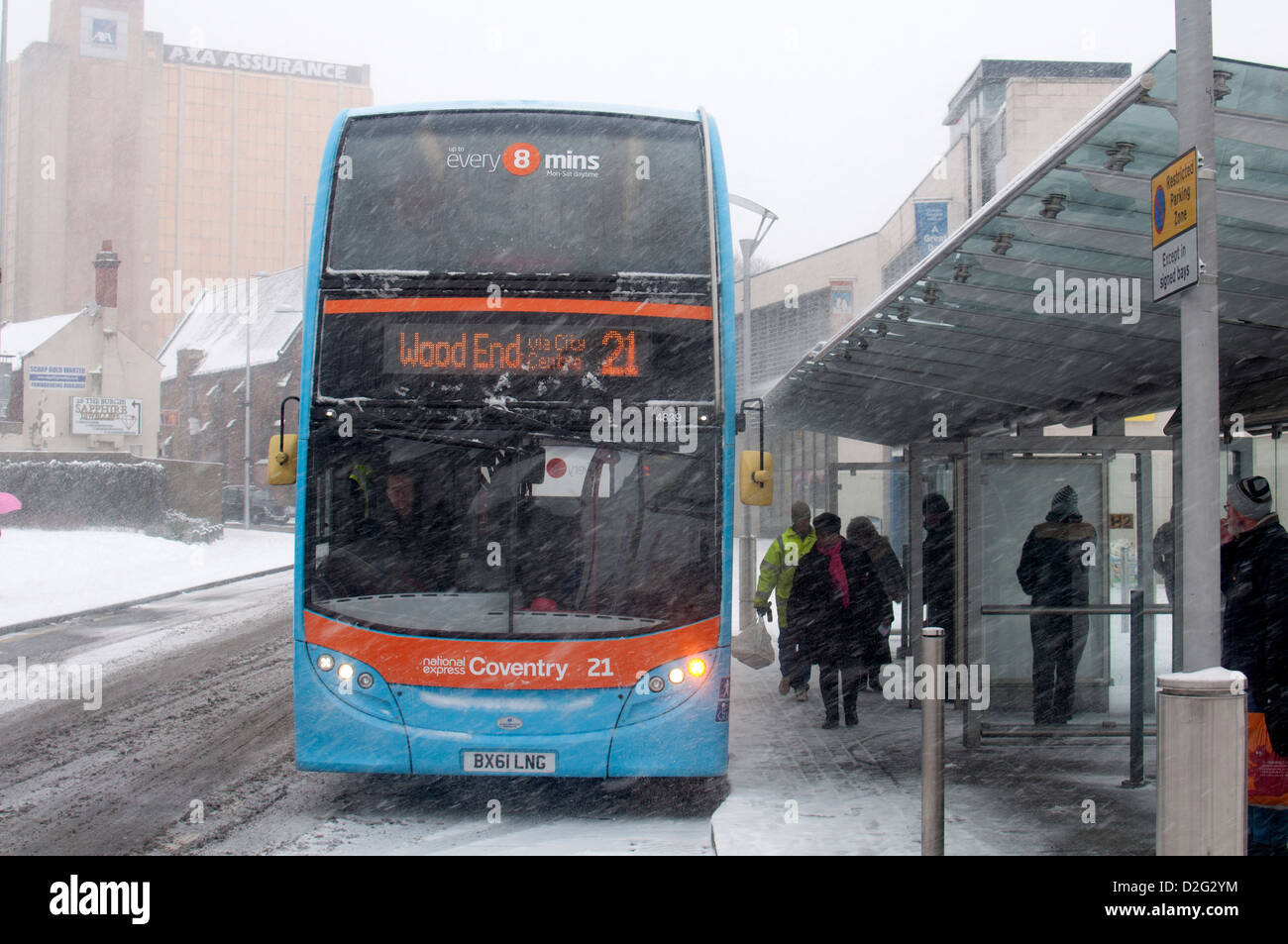 Bus in snowy weather, Coventry city centre, UK Stock Photo