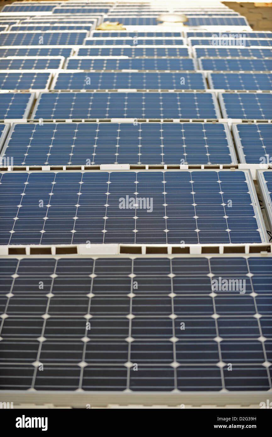 Rows of solar panels fitted on the roof of Hove town Hall Stock Photo ...