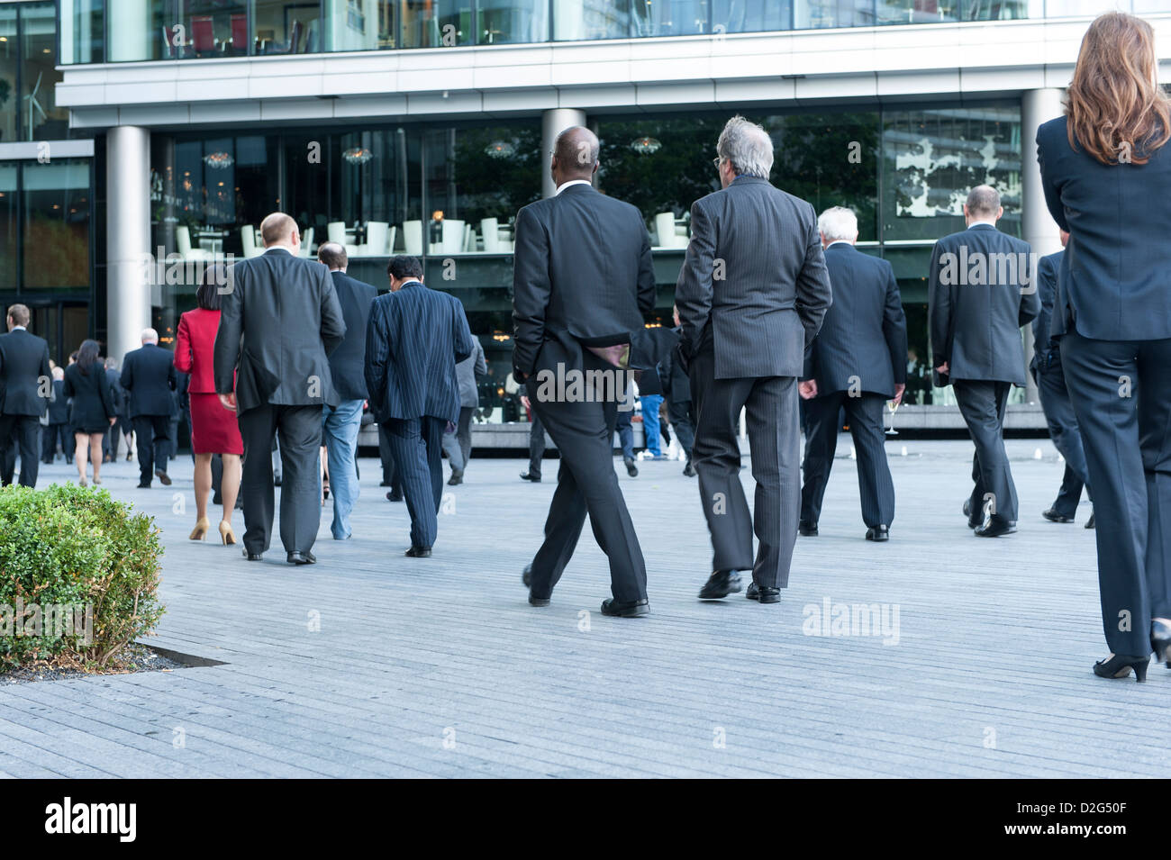 England, London, More London, Southbank. City workers lawyers, returning to their office, work place at More London. Stock Photo