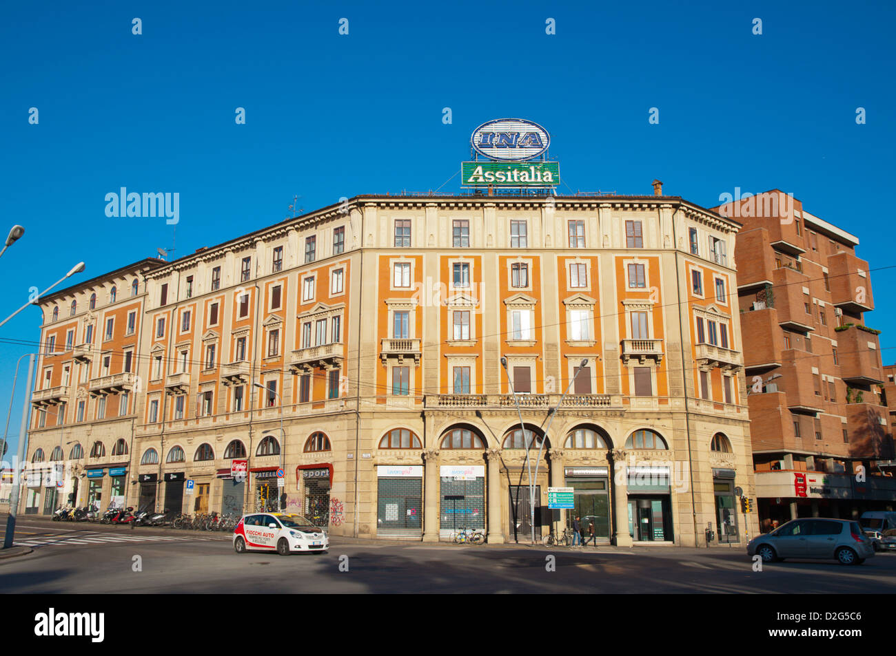 Traffic next to the main railway station at Piazza XX Settembre square central Bologna city Emilia-Romagna region northern Italy Stock Photo