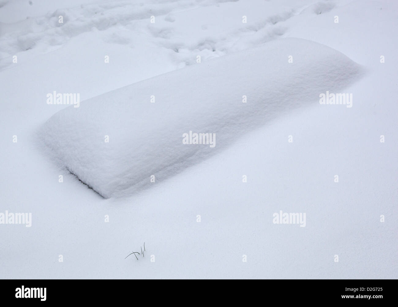 Grave under snow Stock Photo