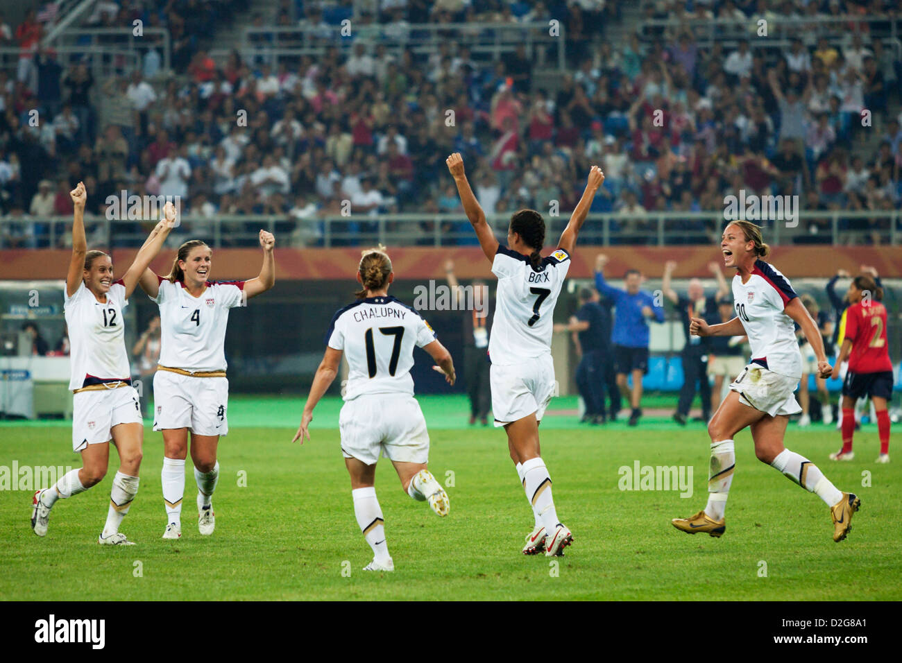 Shannon Boxx of the United States (7) celebrates with teammates after scoring a goal against England in the Women's World Cup Stock Photo