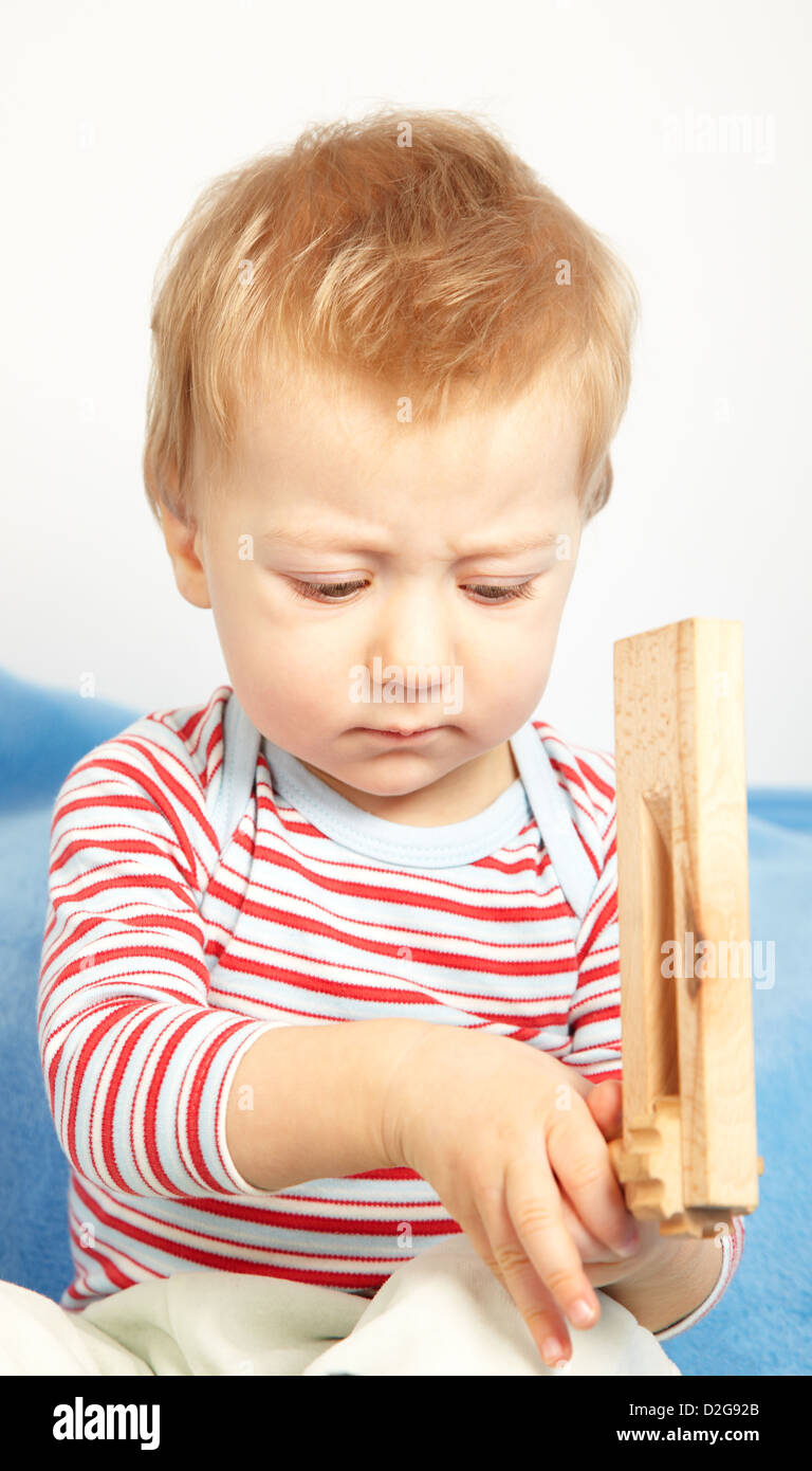 Studio portrait of a sad one year old baby boy Stock Photo Alamy
