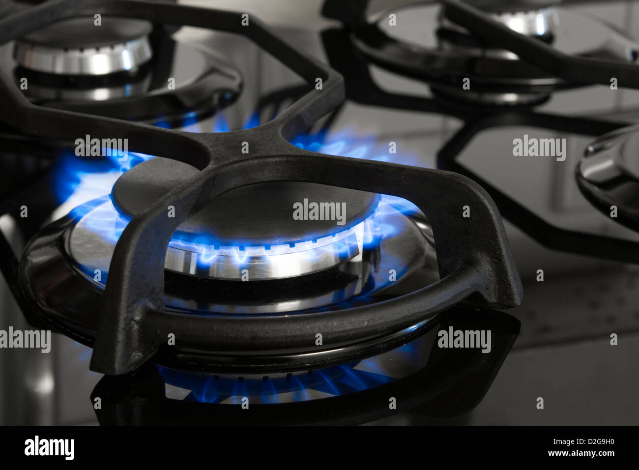 Closeup of gas burning range Stock Photo