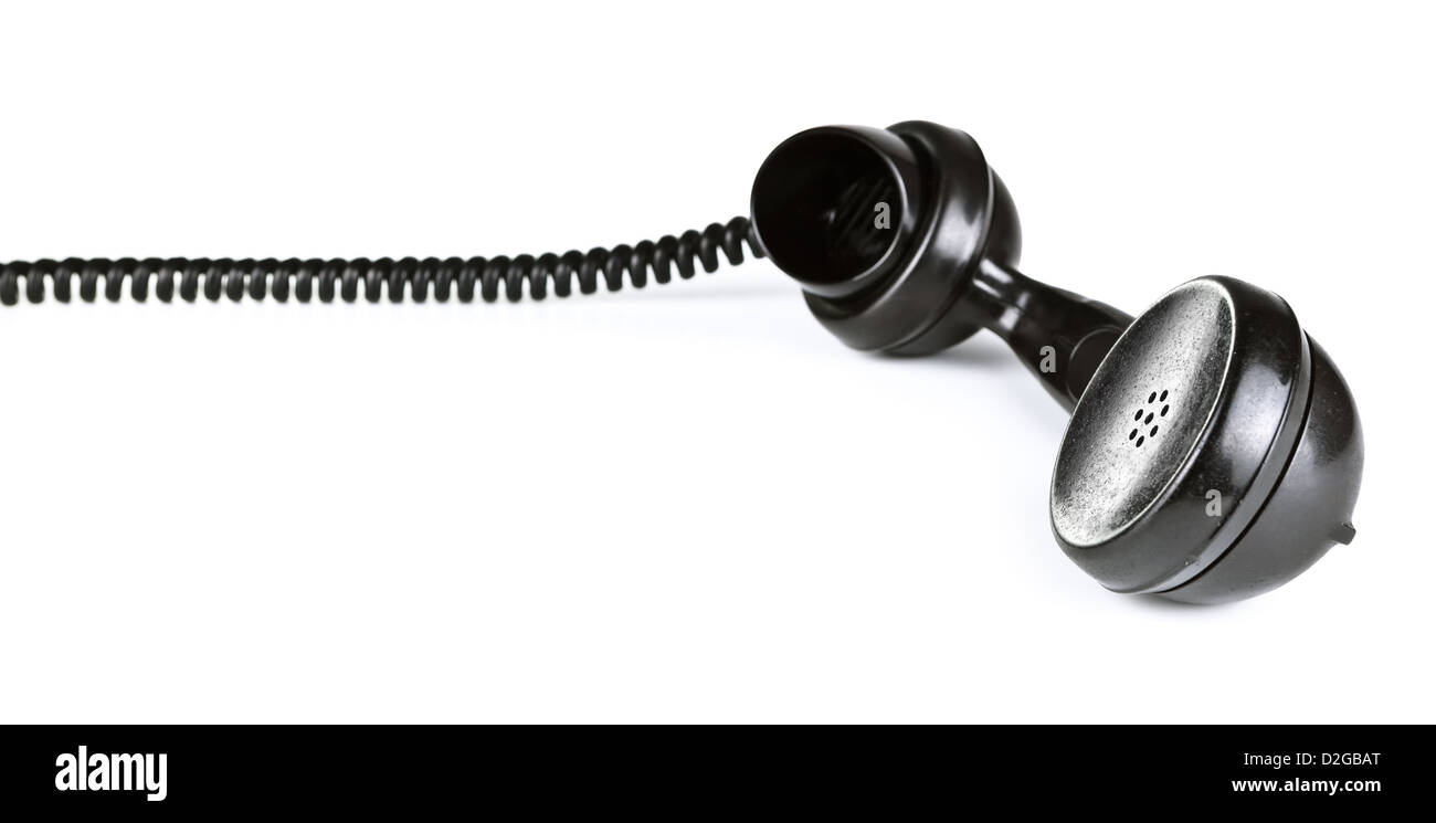 Old black telephone receiver with cord on white background Stock Photo