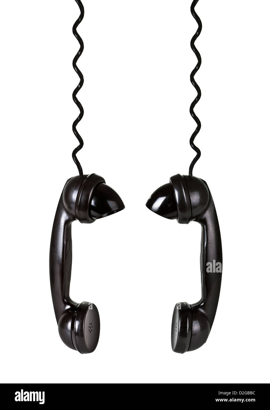 Two vintage handsets with cords isolated on white background Stock Photo