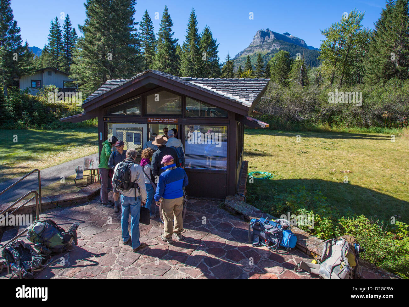 Hikers at Goat Haunt ranger station in Glacier National Park Montana Stock Photo