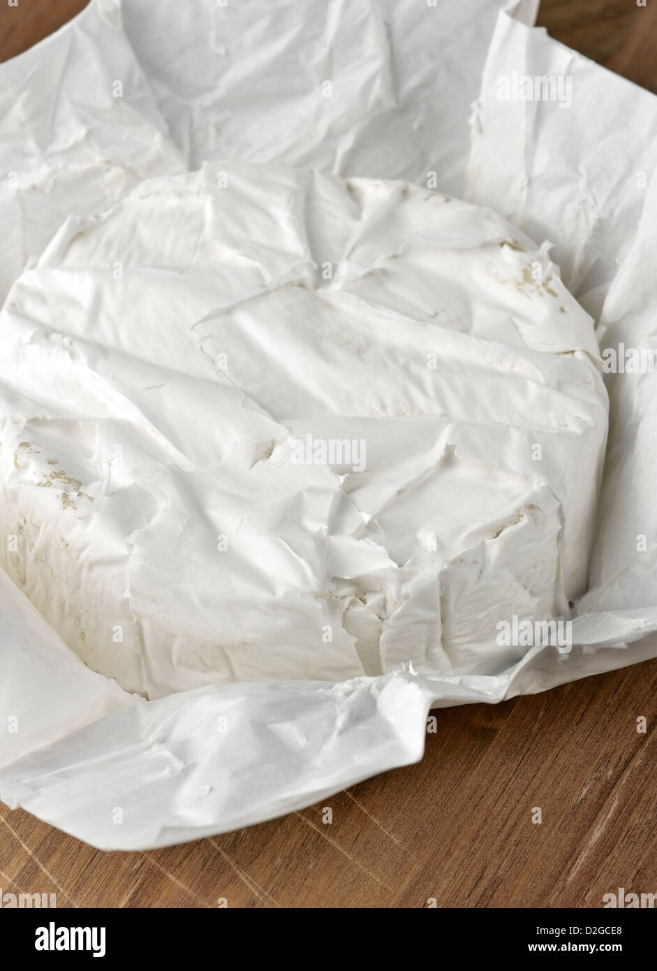 Brie Cheese On A Paper Packaging Stock Photo Alamy