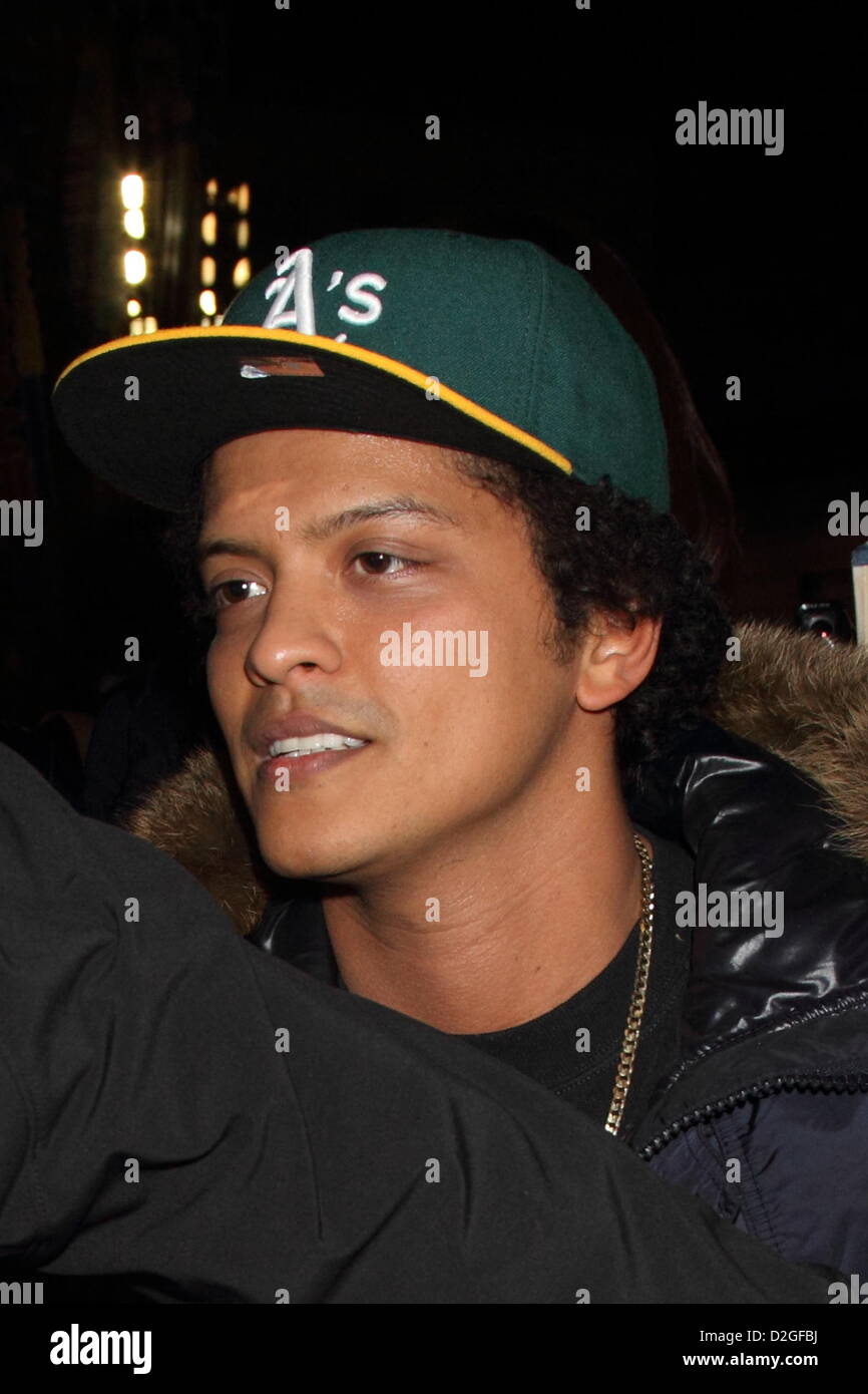 Bruno Mars in Tokyo on January 23rd, 2013. American singer Bruno Mars was  happy to sign autographs and greet some fans after attending the  traditional first Sumo tournament of the year at