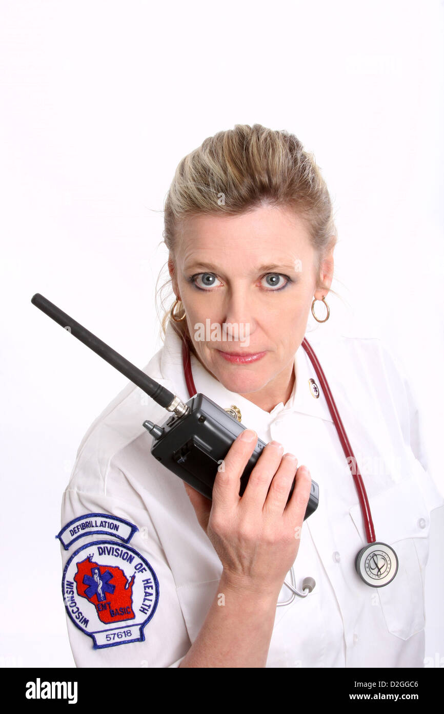 A Wisconsin EMT wearing a stethoscope and talking on a portable radio
