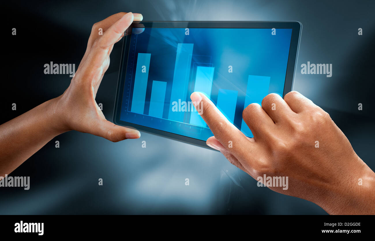 a woman hands use a digital tablet to make a graph Stock Photo - Alamy
