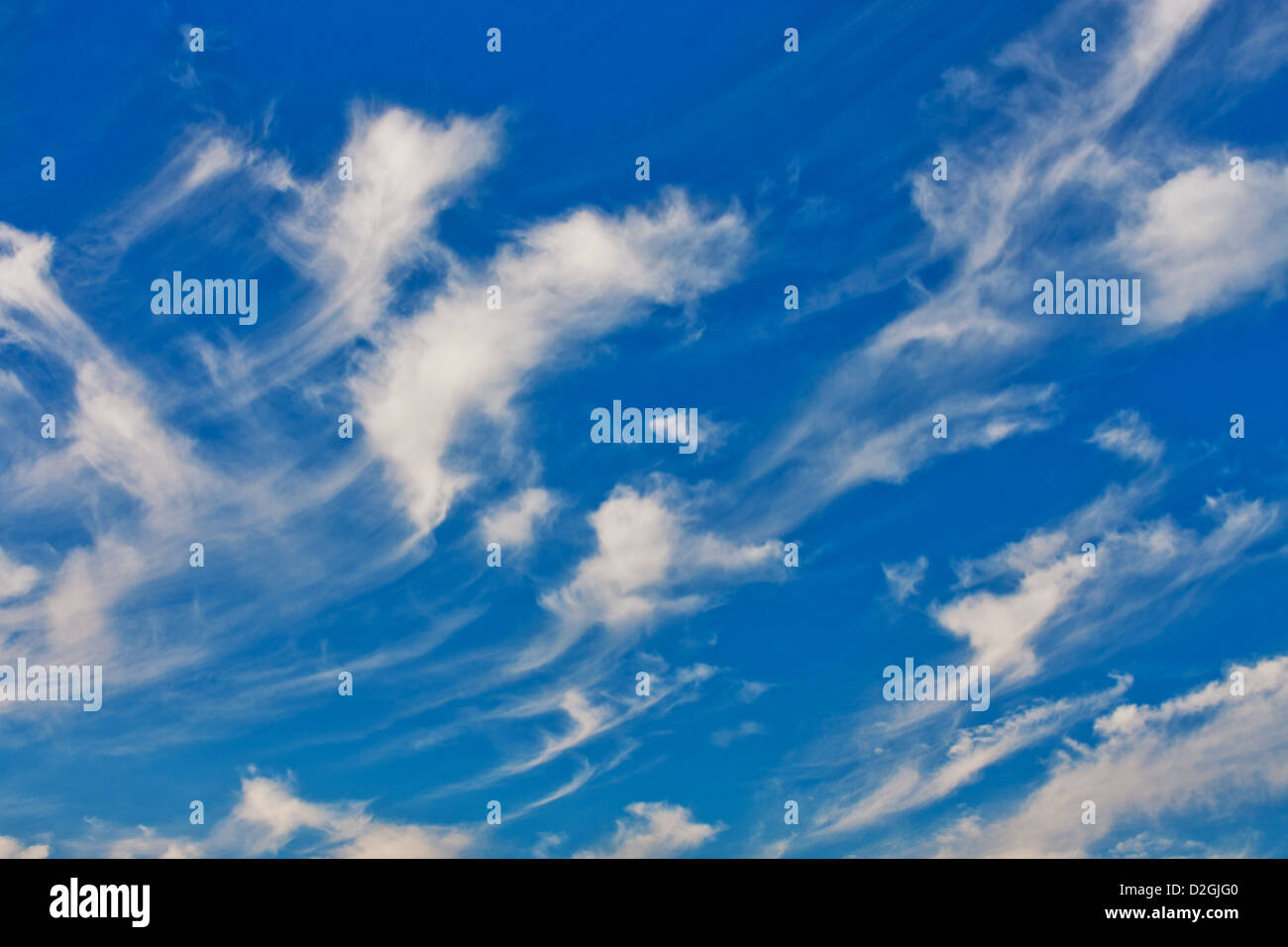 Fluffy clouds and blue sky in the daytime Stock Photo - Alamy