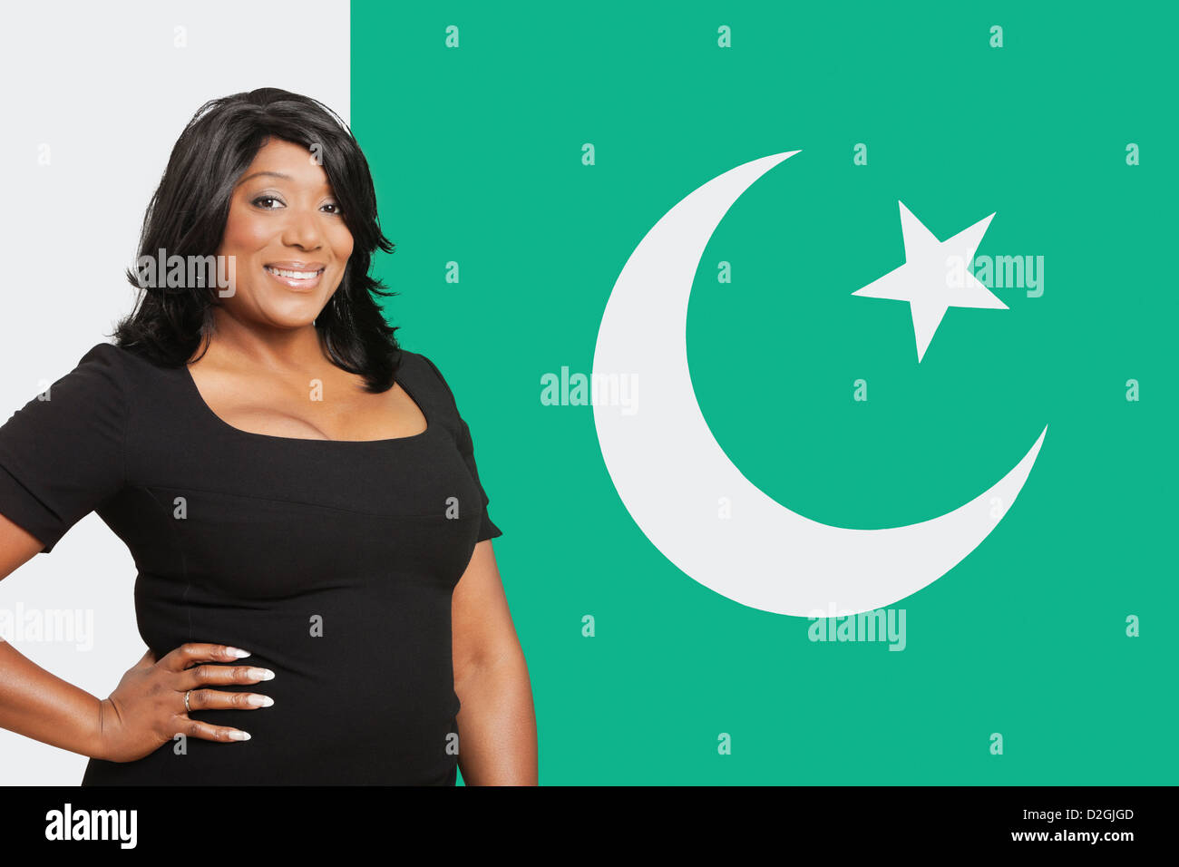 Portrait of casual mixed race woman against Pakistani flag Stock Photo