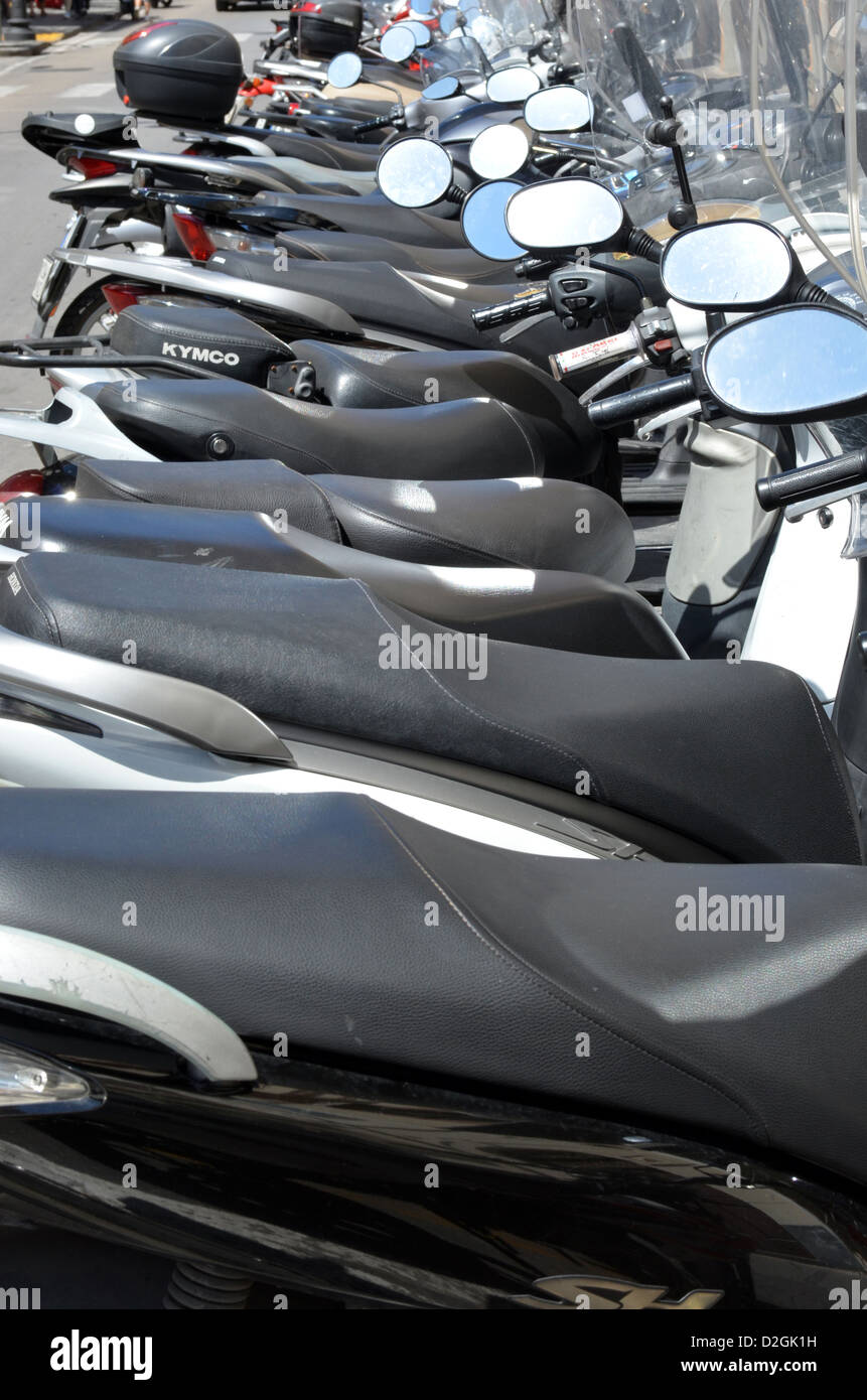 A pattern formed by a  row of scooters in Sorrento, Italy which is on the Amalfi Coast. Stock Photo