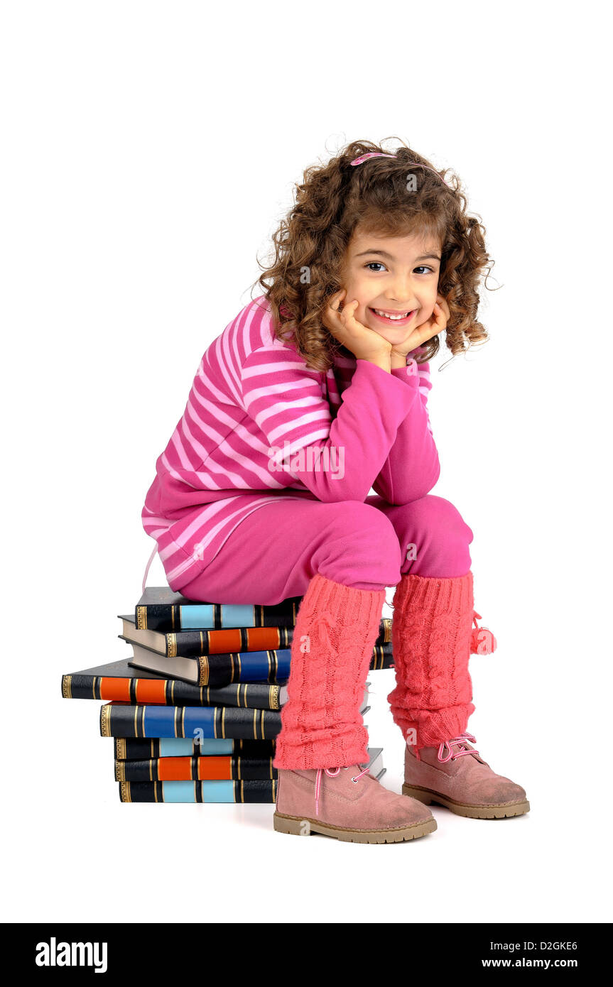 Young girl posing with books isolated in white Stock Photo - Alamy