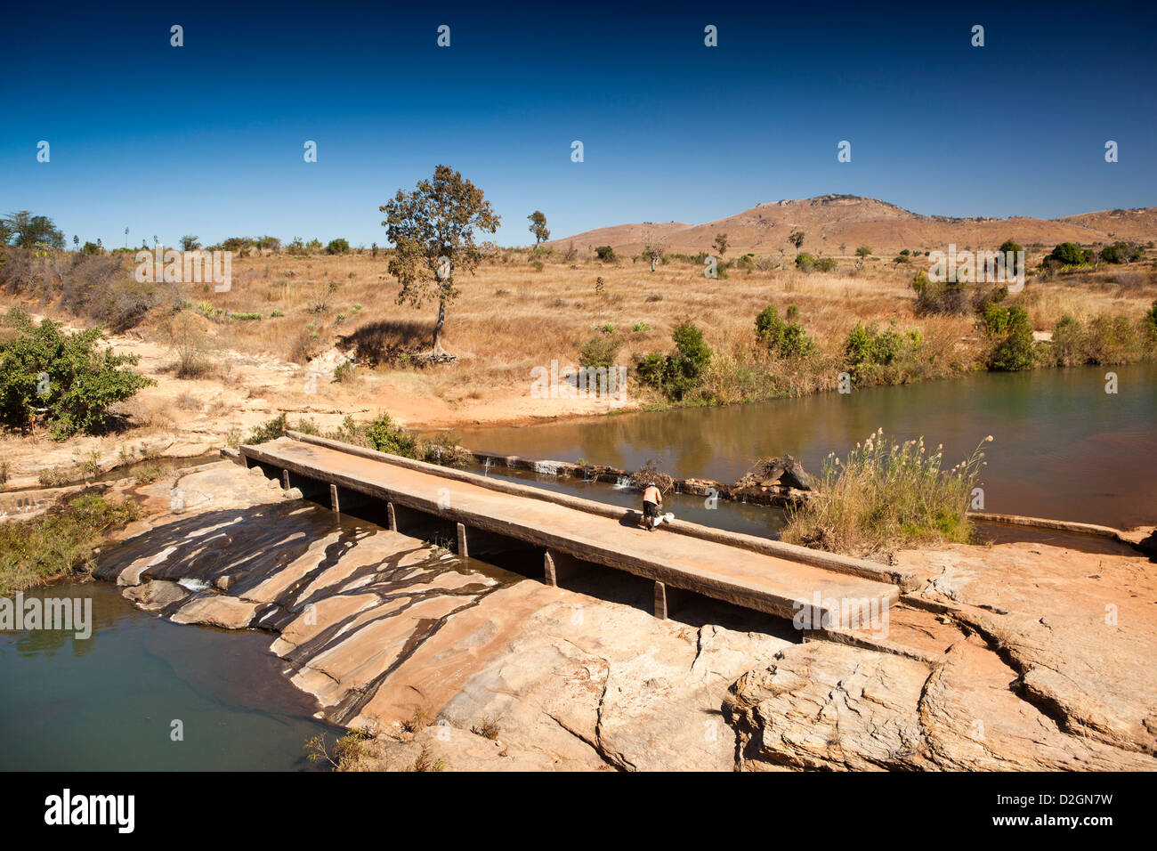 Madagascar, Ihosy, former highway bridge crossing river Stock Photo