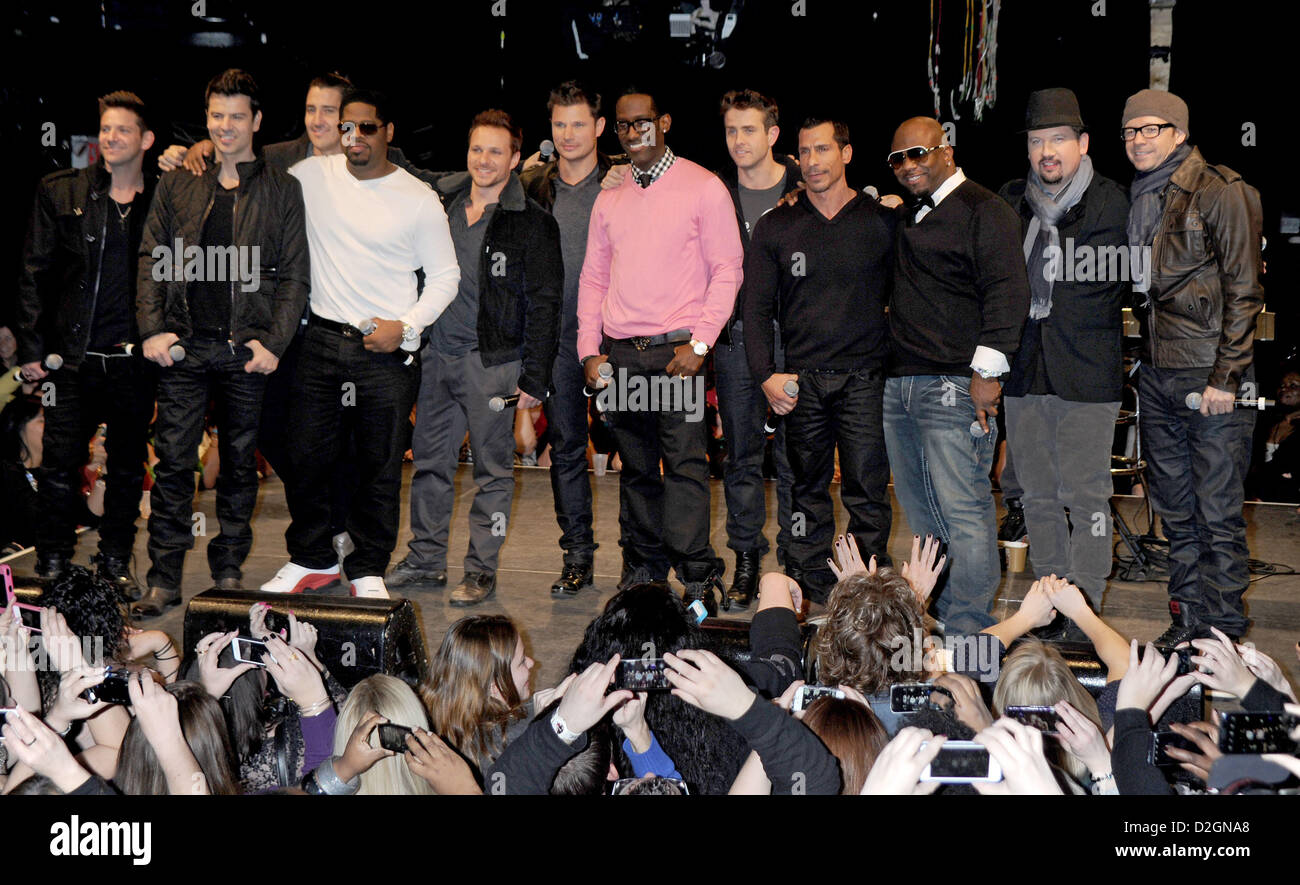 Band members from New Kids on the Block, 98 Degrees, and Boyz II Men (L-R) Jeff Timmons, Jordan Knight, Jonathan Knight, Nathan Morris, Drew Lachey, Nick Lachey, Shawn Stockman, Joey McIntyre, Danny Wood, Wanya Morris, Justin Jeffre, and Donnie Wahlberg during the New Kids On The Block Tour Announcement at Irving Plaza on January 22, 2013 in New York City Stock Photo