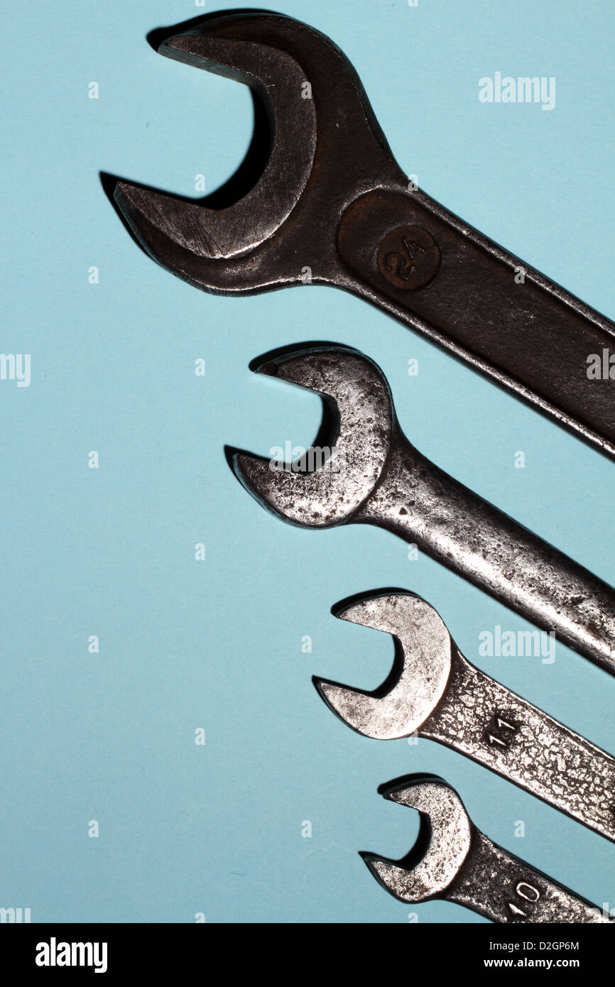old spanners over blue Stock Photo Alamy