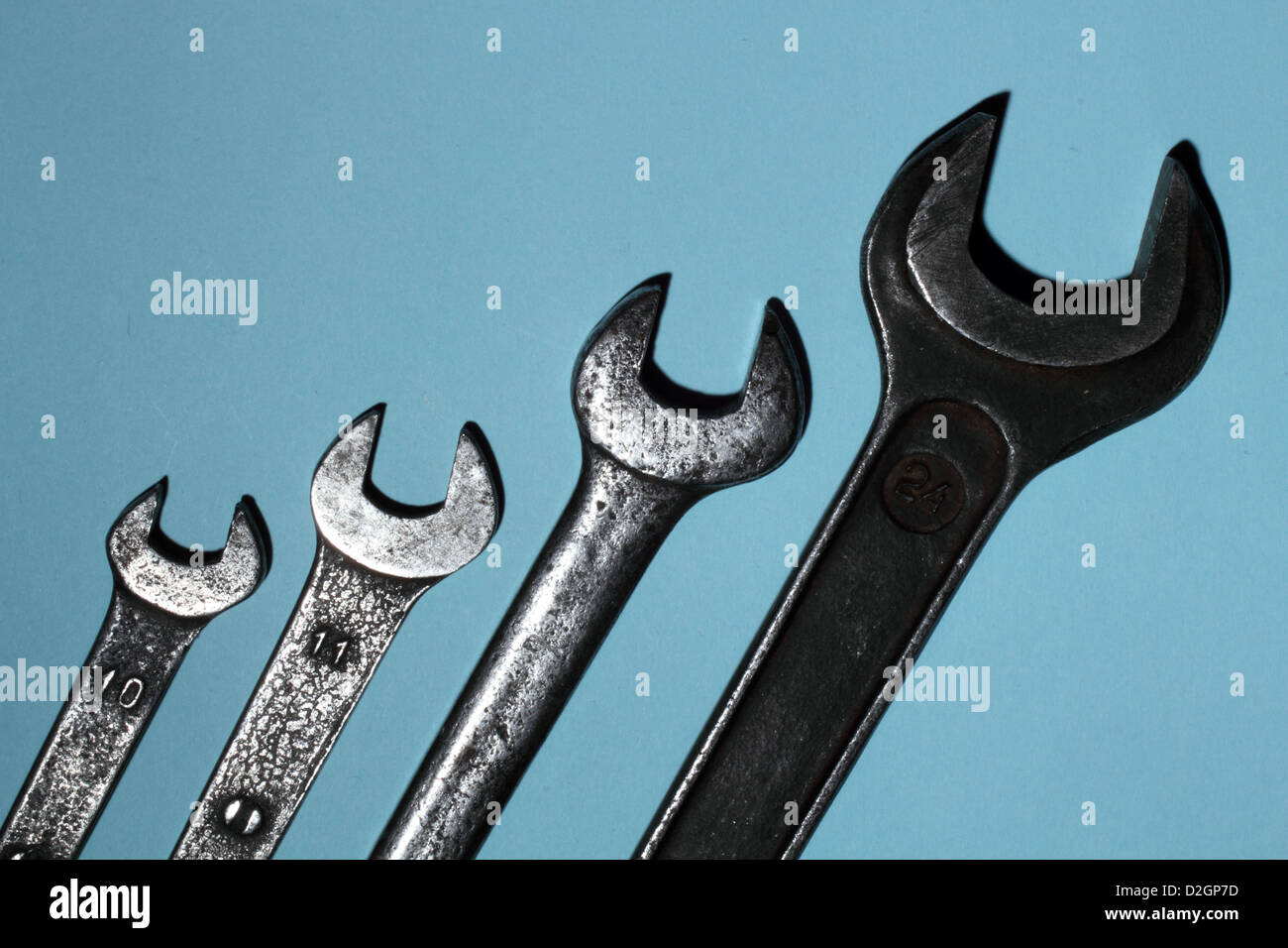 old spanners over blue Stock Photo Alamy