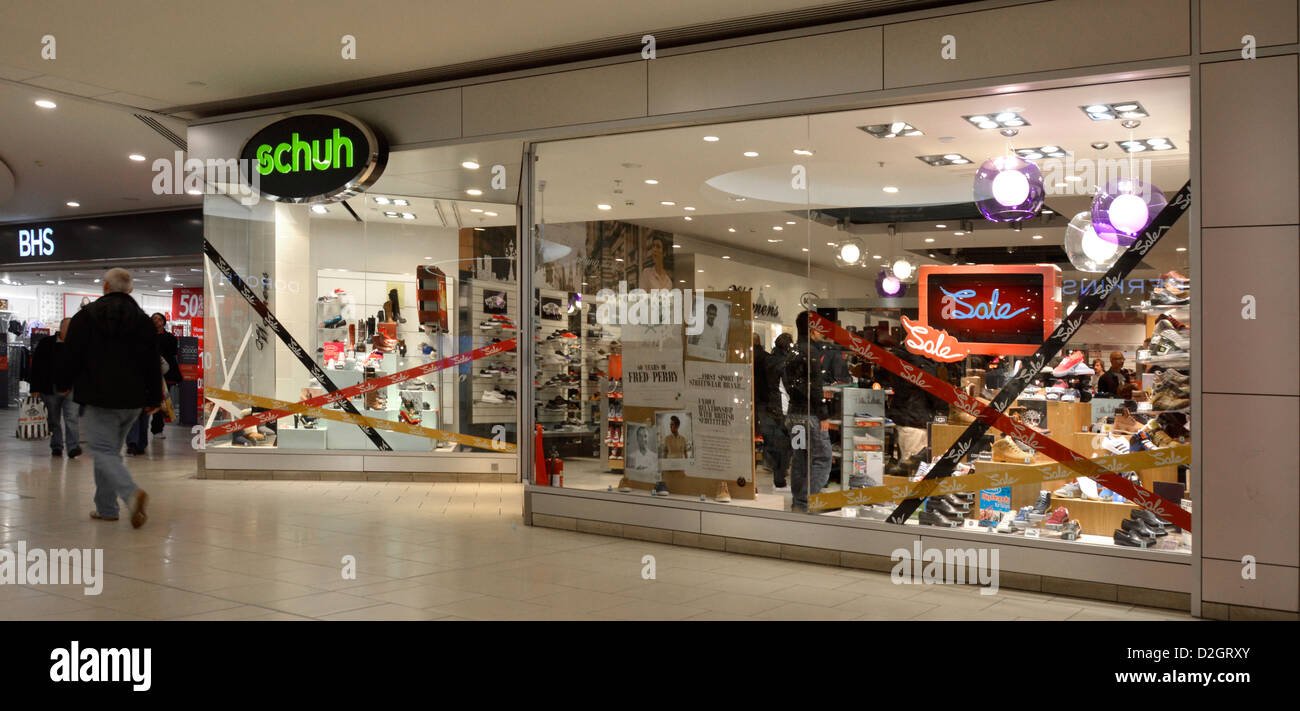 Shoe shop front window display in shopping mall at schuh store sale Lakeside West Thurrock Essex England UK Stock Photo