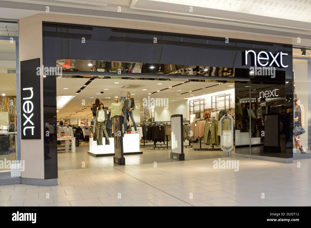 Next Clothing Store Shop Front Window In Shopping Mall Stock Photo