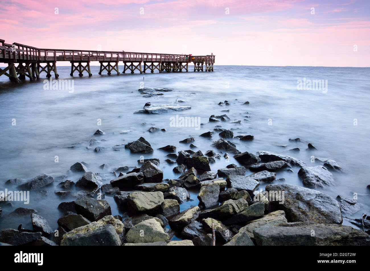 Sunset at the pier at Downs Memorial Park in Maryland, USA, overlooking the Chesapeake Bay Stock Photo