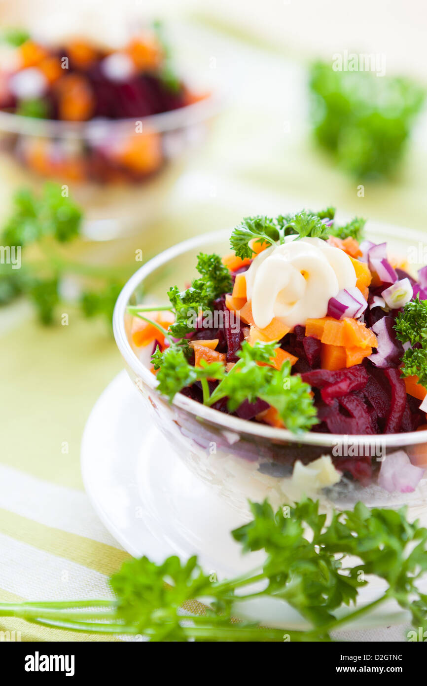 tasty salad with baked vegetables and herring, closeup Stock Photo