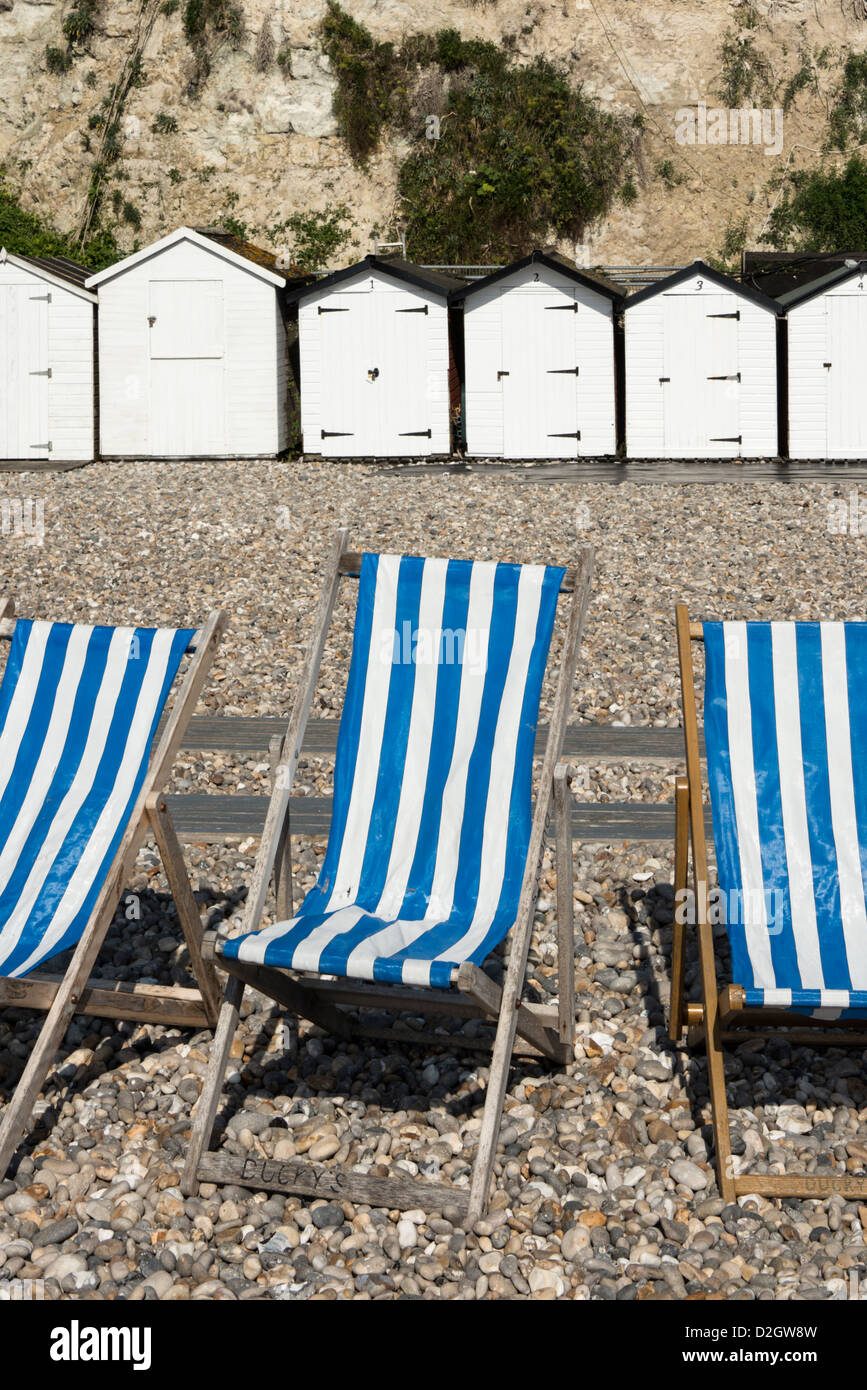 Seaside uk beach huts deck chairs hi-res stock photography and images ...