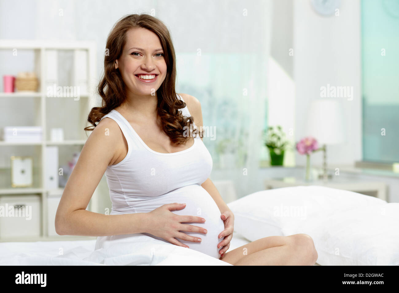 Pregnant Woman Belly Holding a Glass of Water Suggesting Importance To  Hydrate during Pregnancy Stock Photo - Image of standing, hand: 210495202