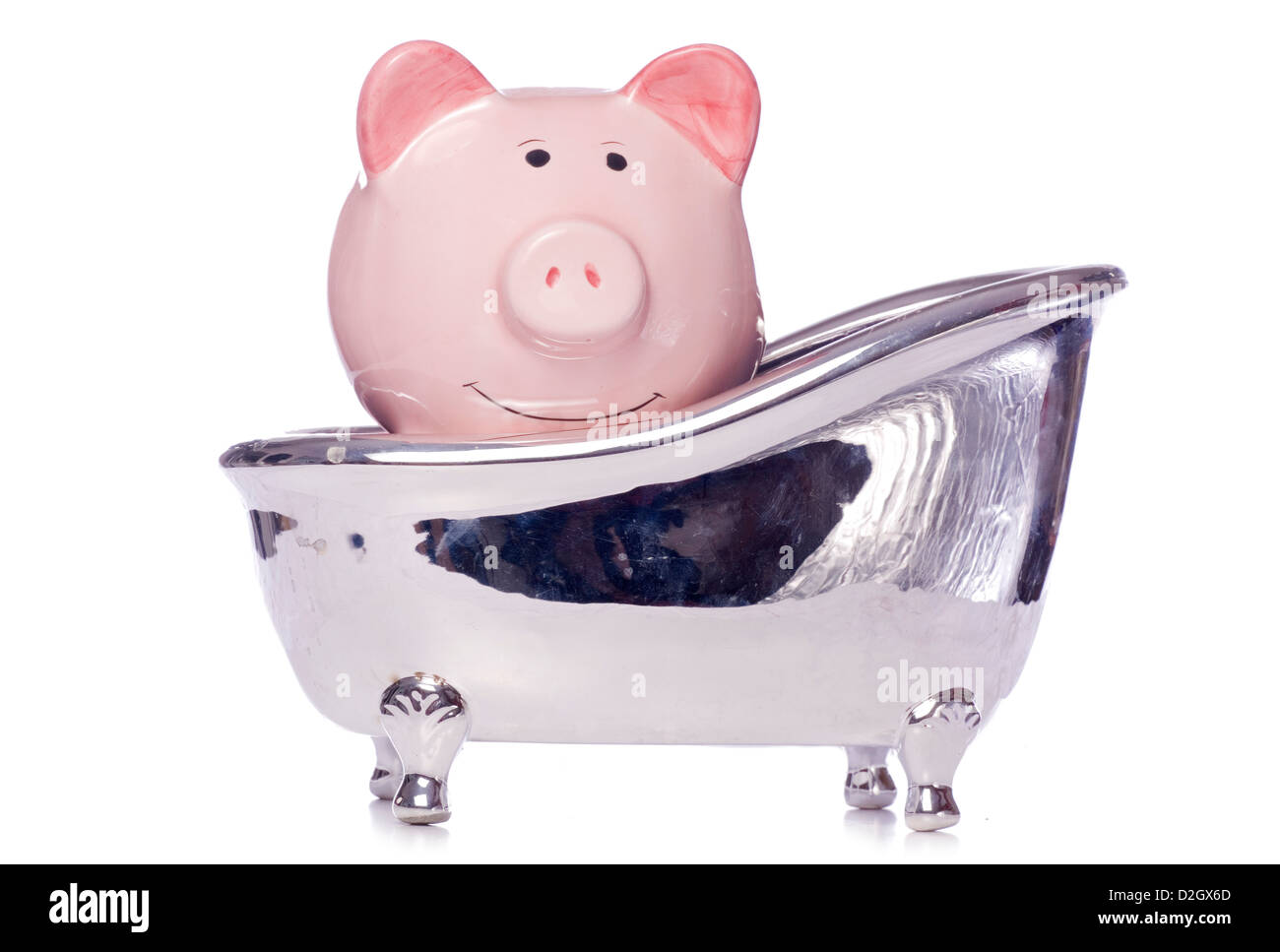 piggy bank in a bath studio cutout Stock Photo