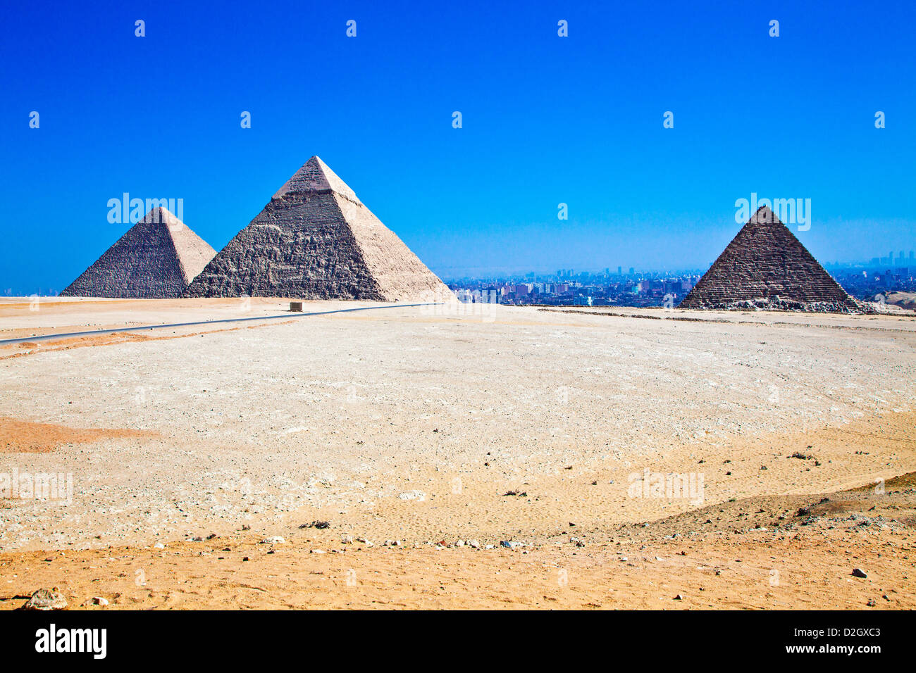 Great Pyramid complex at Giza necropolis in Cairo, Egypt. Cheops/Khufu left, Khafre/Chephren centre, Menkaure/Mykerinos right. Stock Photo