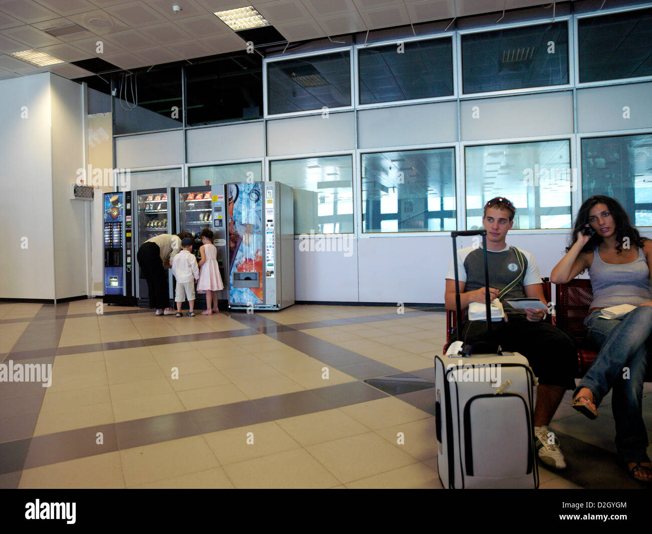 Palermo Airport Sicily Italy Departure Lounge Passengers Waiting and Drinks Machines Stock Photo