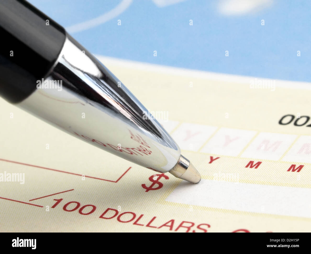 Pen on the Check Stock Photo Alamy
