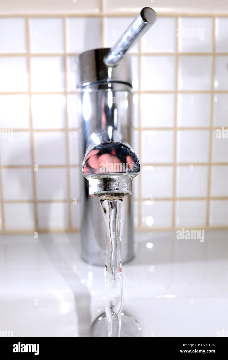water running from a bathroom tap Stock Photo Alamy