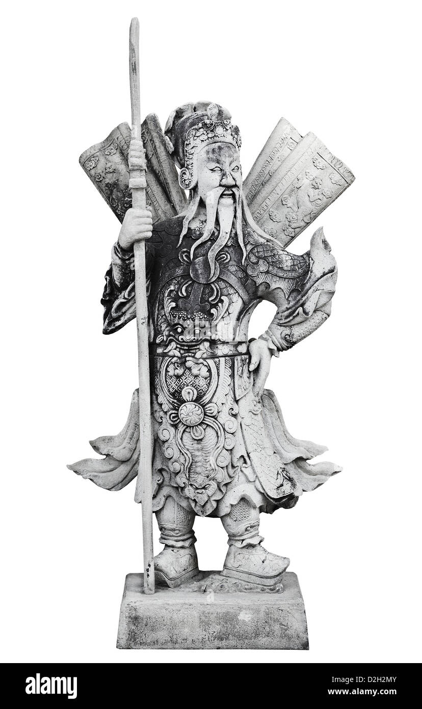 Old stone traditional asian guardsman in decorated dress in Chinese style Stock Photo