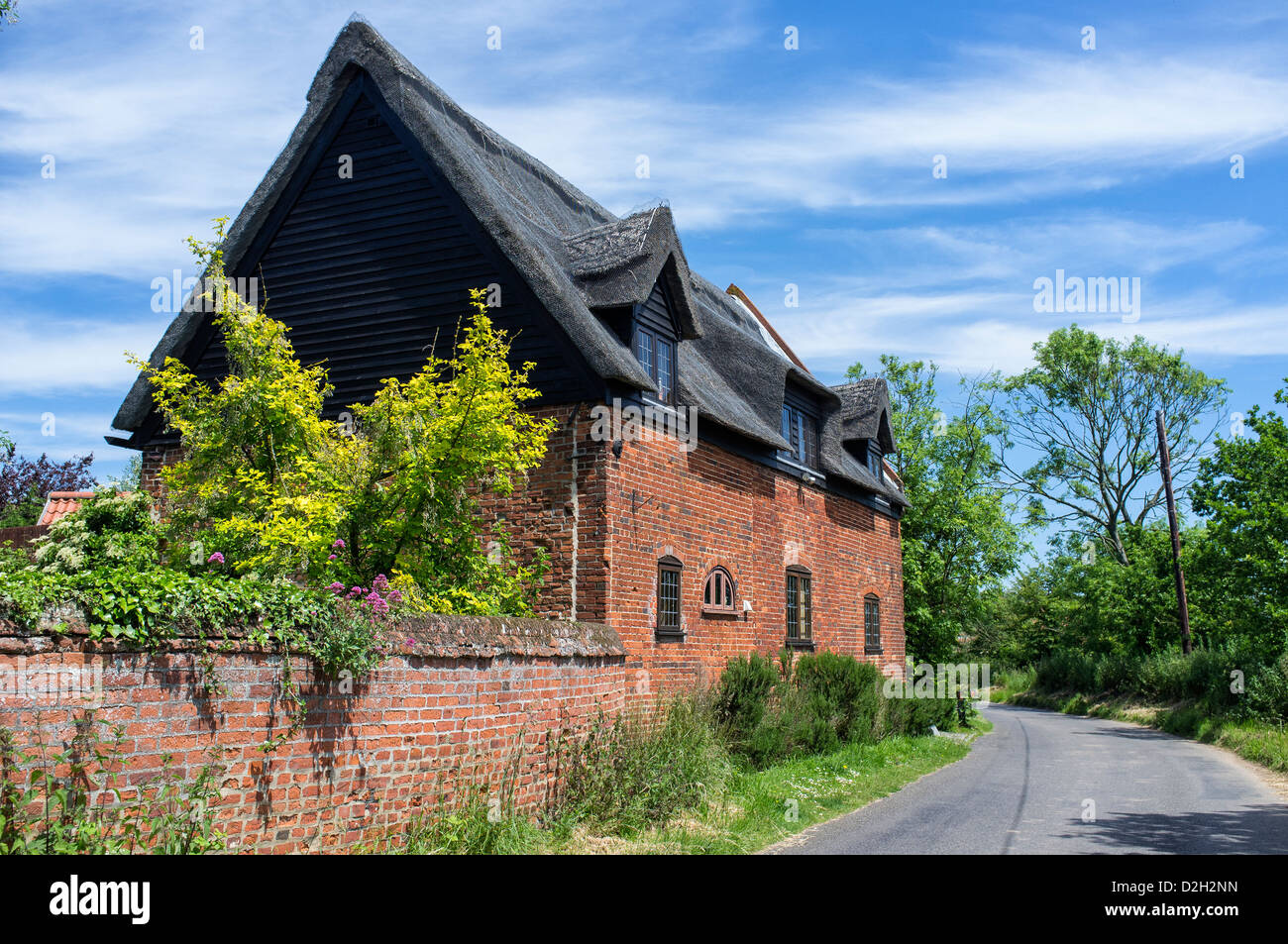 Traditional Thatched Country House at Potter Heigham Norfolk UK Stock Photo