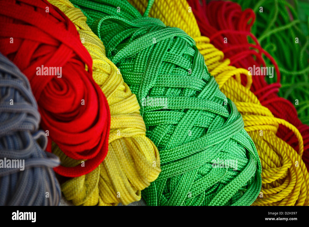 Heap of colored threads in the market in Pushkar, India. Stock Photo
