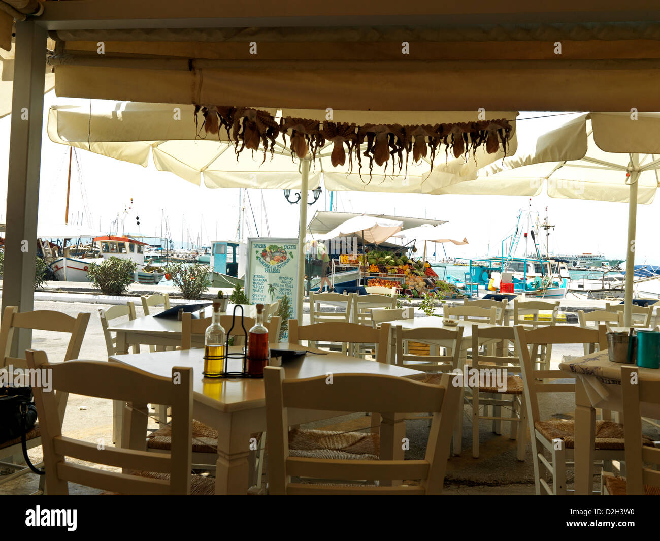 Aegina Greece Empty Restaurant By The Sea Drying Octopi Stock Photo