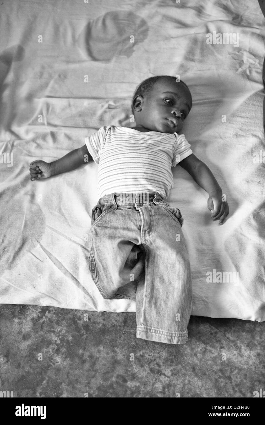 A small baby who was apparently abandoned at birth by the mother in Uganda. Stock Photo
