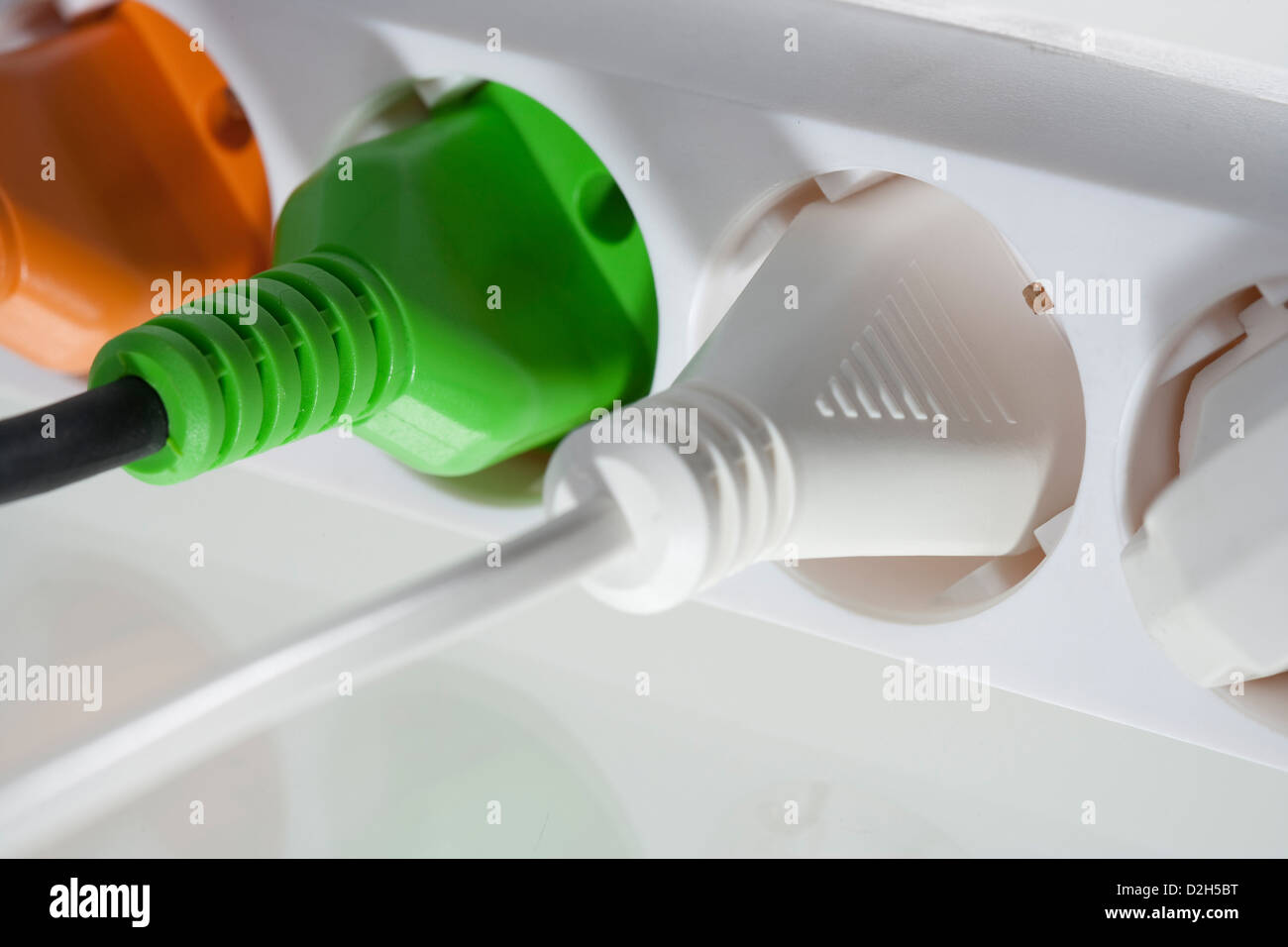 Berlin, Germany, power strip with different colored plugs Stock Photo