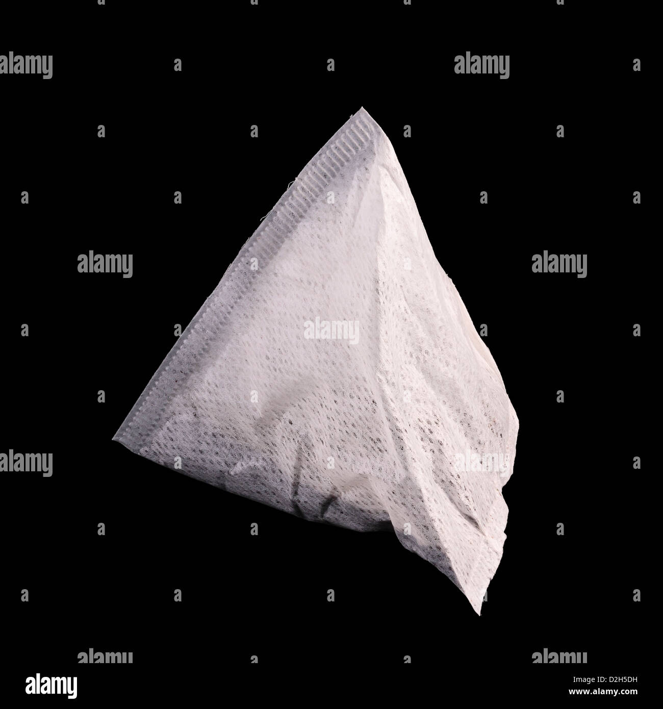 PG Tips pyramid tea bag isolated on black background Stock Photo